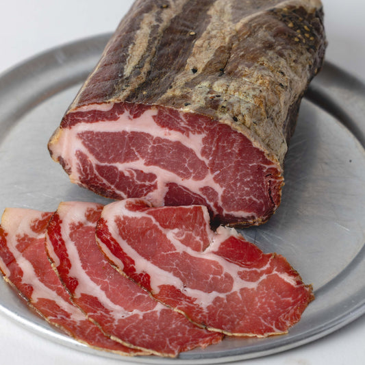 Coppa, whole piece with thin slices cut