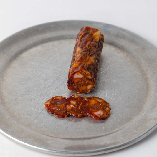 Topsham Chorizo, whole 100g stick with slices cut to show the inside