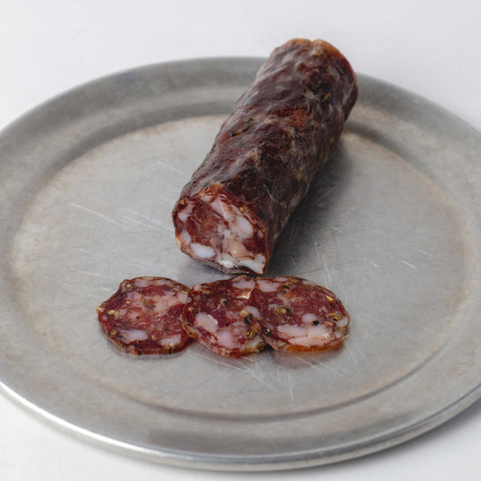 Wild Venison and Port Salami, whole 100g stick with slices cut to show the inside